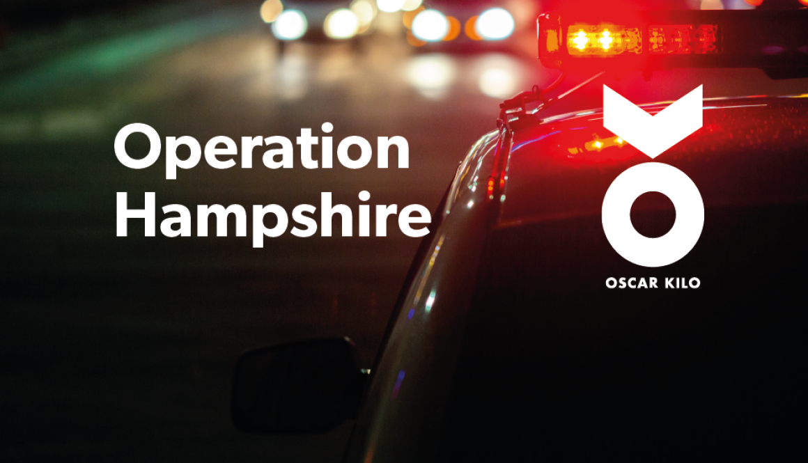 A police car with lights on drives down a road at night with cars coming from the opposite direction. White text reads "Operation Hampshire" and the white Oscar Kilo logo (a sideways OK) is to the right of the image