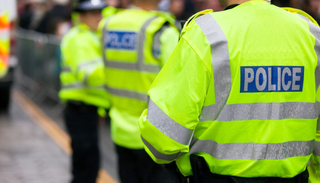 Image of police officers on crowd control at a UK event