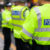 Image of police officers on crowd control at a UK event