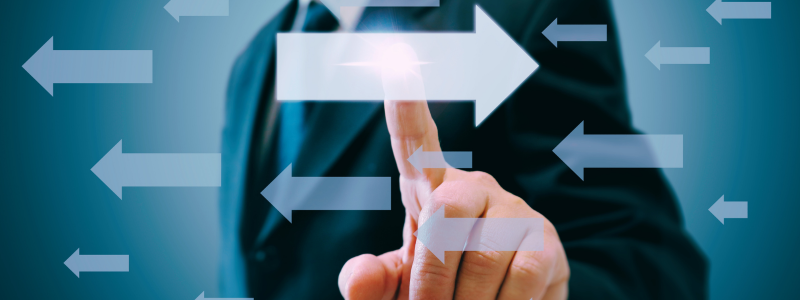 Business Change & Transformation Finger pointing to an arrow on the screen