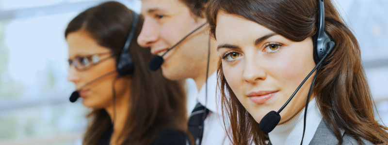 woman in a customer service office looking at the camera
