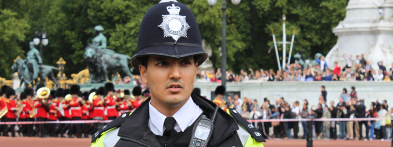 Officer standing on a crowded square
