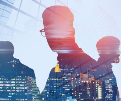 Image of profile of people on a digital skyline