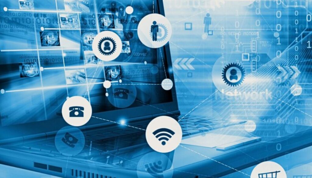 Open laptop with digital icons floating around it