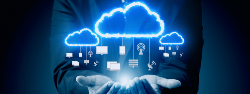 Hands holding digital cloud and icons
